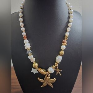 Elegant Gold and White Charm Necklace